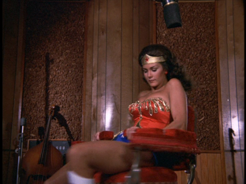 Wonder Woman frees herself from a spinning chair
